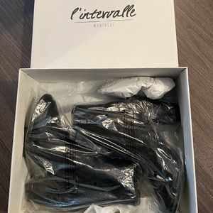 L’intervalle ankle bootie. Black leather. Size 7. 2.5 inch block heel. Brand new